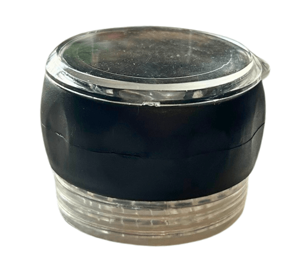 Black plastic spice grinder cap with clear lid